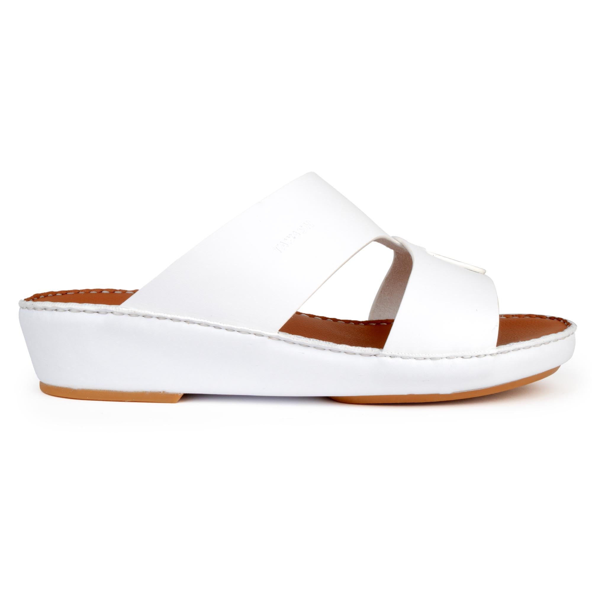 White sandal with brown sole on a white background