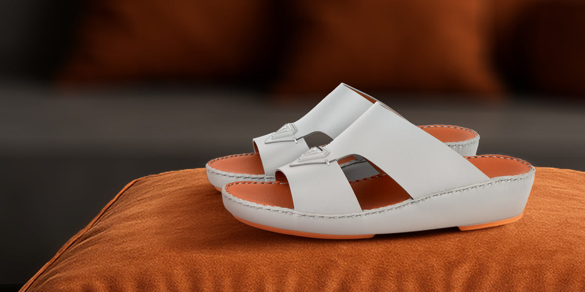 Tawash white Arabic sandals with tan footbeds